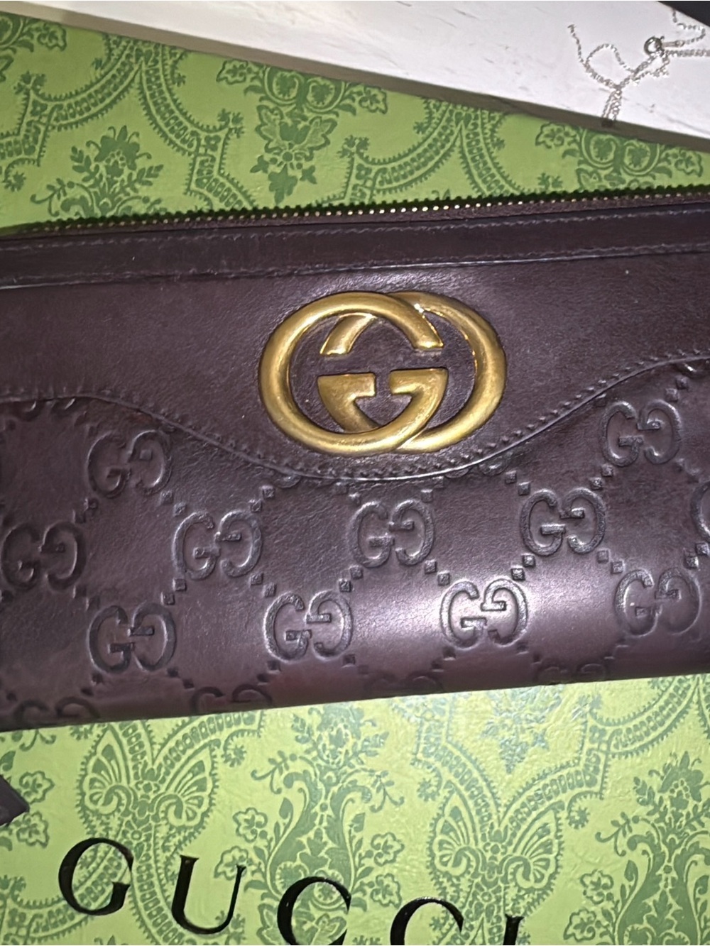 Gucci Guccissima zip-around wallet features signature embossed monogram leather - Picture 6 of 14